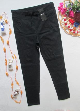 Суперовые стрейчевые черные брюки с прорезями высокая посадка rohina