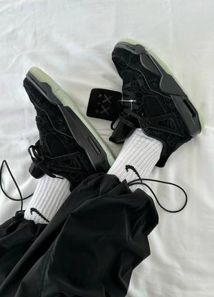 Nike air jordan retro 4 x kaws black premium6 фото