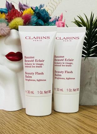 Оригинальный бальзам моментального действия для лица clarins beauty flash balm1 фото