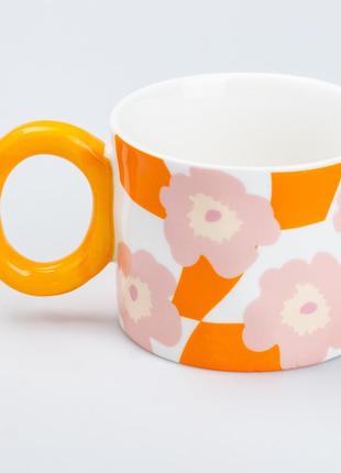 Чашка керамічна 400 мл для чаю та кави "квітка" помаранчева1 фото