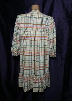 Сукня розлітайка бежевого кольору у кольоровуклітину.об'ємнірукави.виробництва італії6 фото