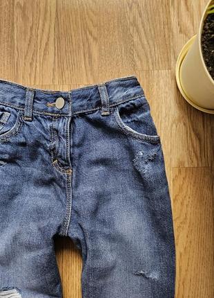Дитячьи джинсы на девушку 8 лет next синие с рваные6 фото