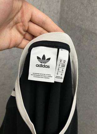 Черная футболка от бренда adidas5 фото