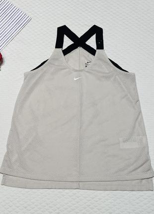 Женская майка фирмы nike dri- fit  оригинал.7 фото