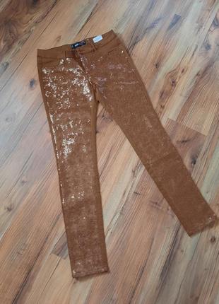 Сток брюки джинсы с пайетками горчичного цвета.
