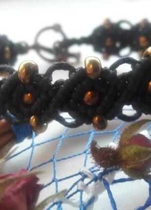 Плетений чорний браслет із золотим бісером4 фото