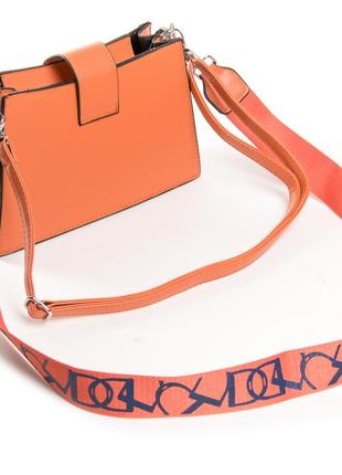 Жіночі сумочки в кольорах6 фото