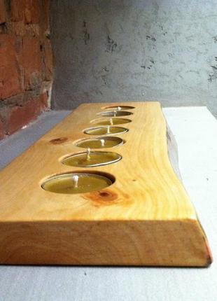 Дерев'яний свічник на 7 чайних свічок з цільного шматка дерева вільхи1 фото