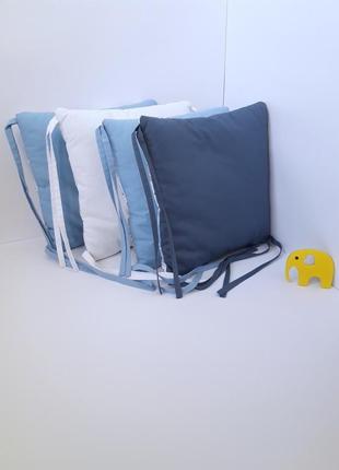 Комплект бортиків-подушок і простирадла на гумці в ліжечко6 фото