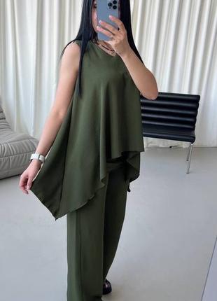 Оригінальний жіночий незвичайний костюм майка вільного крою подовжена і широкі брюки з жатки