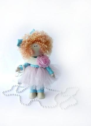 Кукла интерьерная текстильная с рыжими кудрями.