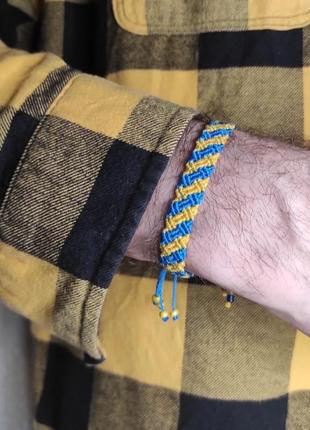 Мужской браслет ручного плетения макраме "янус" charo daro (сине-желтый)1 фото