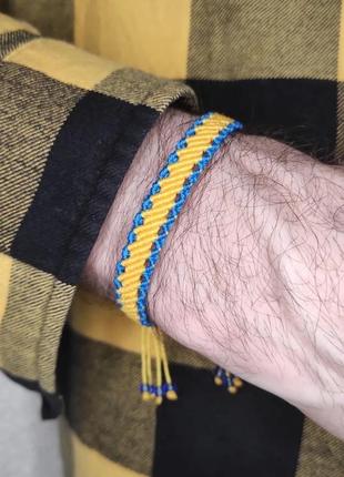 Мужской браслет ручного плетения макраме "ратибор" charo daro (жёлто-синий)