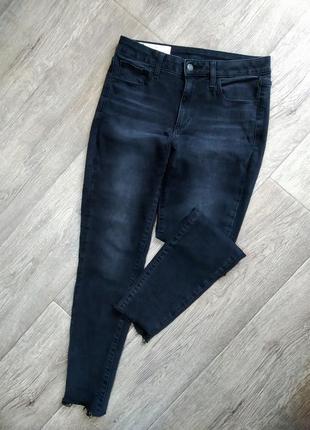 Класні стрейчеві джинси gap з необробленим низом