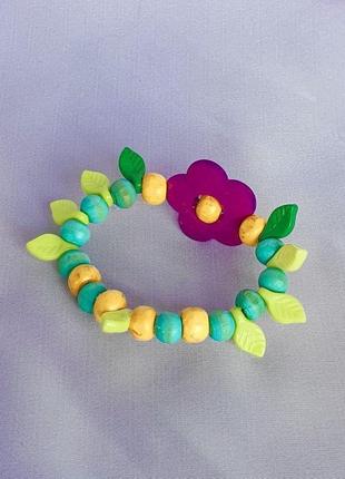 Дитячий браслет для дівчинки "квіти в саду" зелений з дерев'яних намистин/оригінальний подарунок малюку4 фото