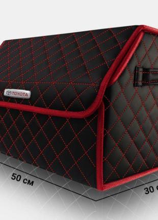 Органайзер в багажник авто toyota от carbag чёрный с красной строчкой и красной окантовкой1 фото