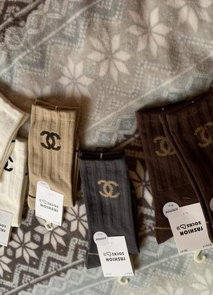 Круті шкарпетки з лого відомих брендів3 фото