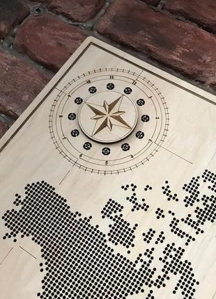 Карта мира из фанеры, перфорированная, декорированная компасом 66,5*47 см2 фото