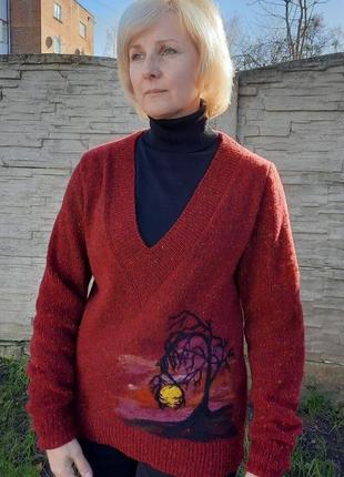 Бордовий пуловер
