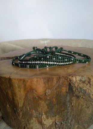 Набор из трёх зелёных браслетов из бисера.1 фото