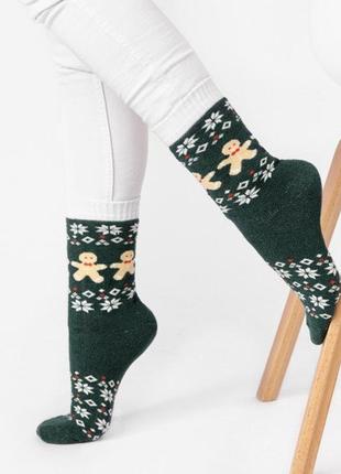 Жіночі теплі шкарпетки з етнічними мотивами і пряниками2 фото