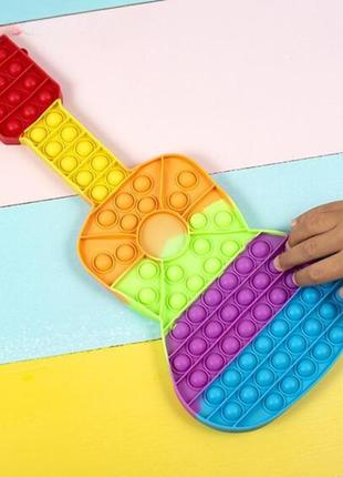 Іграшка поп іт гітара. іграшка антистрес для дітей поп іт