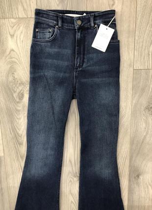 Джинси кльош з високою талією