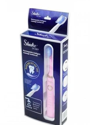 Электрическая зубная щетка shuke с 4-мя насадками4 фото