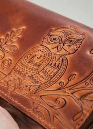 Зручний довгий шкіряний гаманець жіночий з орнаментом тиснення рижий6 фото