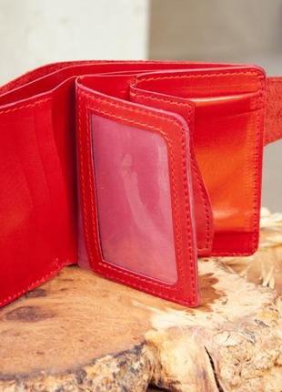 Красный кожаный кошелек на 10 отделов (имеет монетницу и прозрачный) с тиснением солнышко4 фото