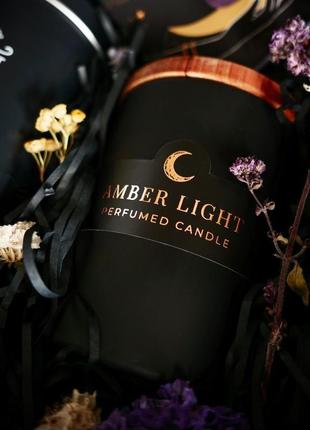 Подарунковий набір (баночка чаю, парфумована свічка "amber light" у склянці з дерев'яною кришкою)2 фото