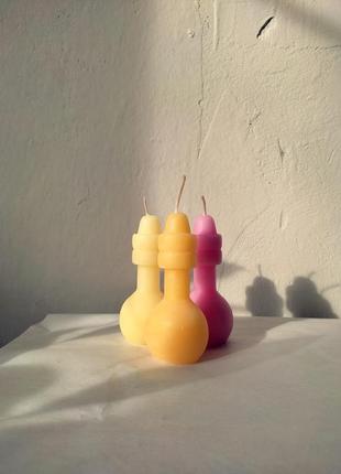 Свеча  в форме игрушки1 фото