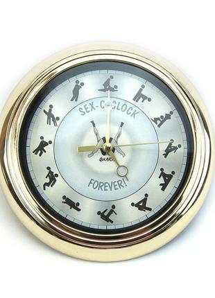 Настінний годинник камасутра маленькі (золотий з чорним)1 фото