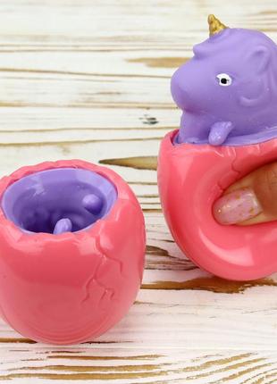 Игрушка антистресс фуфлик единорог сиреневый из розового яйца