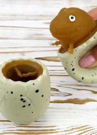 Іграшка антистрес фуфлік дракон коричневий  із бежевого яйця