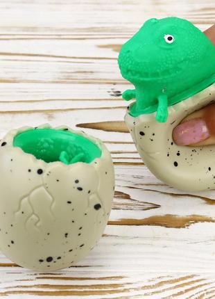 Іграшка антистрес фуфлік дракон із яйця (зелена)1 фото