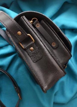 Черная кожаная мужская сумка на ремне "лев"3 фото