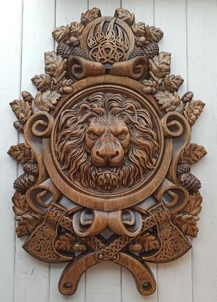 Панно: голова льва с топорами (1021110)1 фото