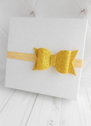 Золотой бантик на повязке малышке украшение для волос девочке на фотосессию подарок на годик1 фото