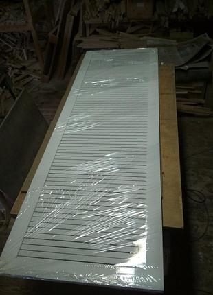 Рейкові дерев'яні дверцята