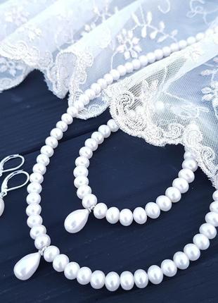 Браслет святковий чи весільний з натуральних перлів з рідкісною перлиною крапля браслет из жемчуга3 фото