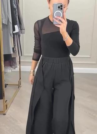 Стильні жіночі штани чорні класичні широкі модні на кожен день 605107g6 фото