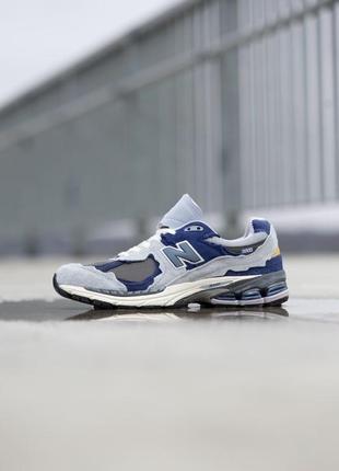 Очень крутые кроссовки new balance 2002r light blue7 фото