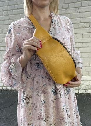 Жіноча шкіряна сумка на пояс, бананка апельсин tarwa "36"2 фото