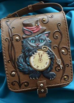 Коричневая кожаная сумка на ремне "чеширский кот"2 фото