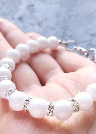 Ніжний сяючий браслет з білих перлів та кристалів подарунок дівчині на день закоханих1 фото