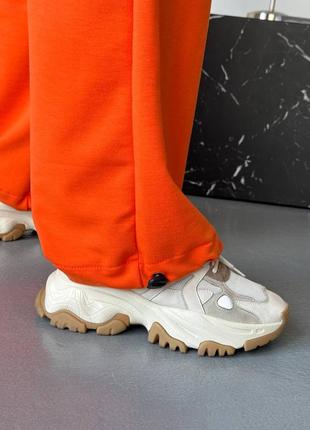 Женский оранжевый стильный качественный костюм комплект свитшот с брюками джогерами трендовый базовы8 фото