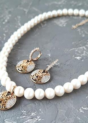 Комплект з натуральних перлів у позолоті кольє та сережки