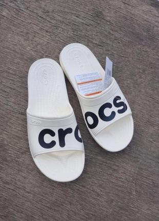 Шлепанцы crocs classic graphic slide 204465 white

м10-43/44-28/28.5см