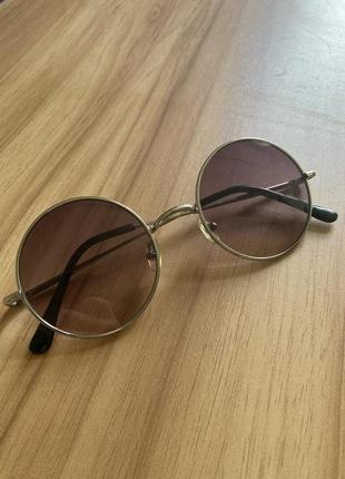 Круглі сонцезахисні окуляри1 фото